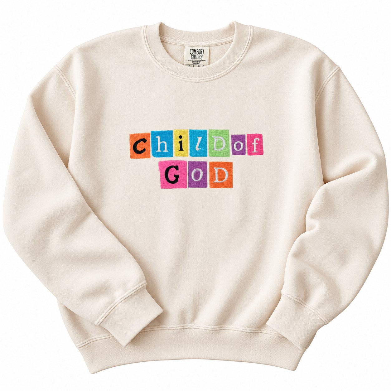 Ivory Comfort Colors sweatshirt embroidered with colorful blocks spelling Child of God